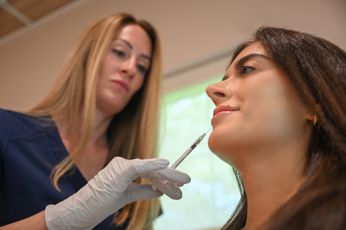 An injector is administering Sculptra in Westlake, OH.