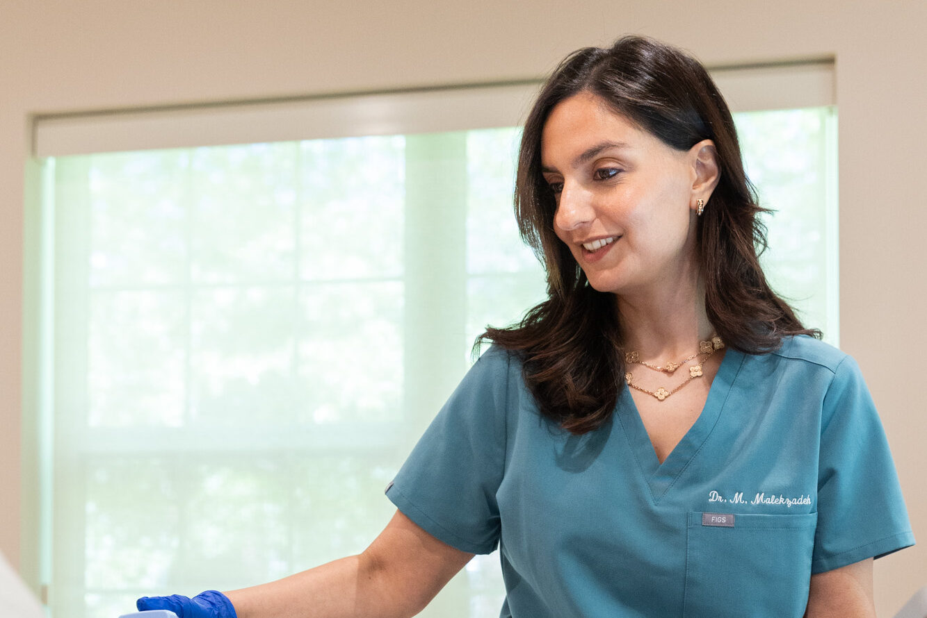 Dr. M prepares to administer a patient's microneedling for stretch marks in Westlake.
